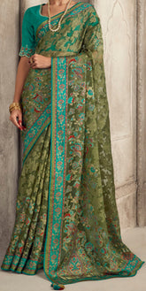 Exquisite Contrasting Green Floral Organza saree with beautiful print, piping work or tassels on pallu | party wear saree | Festive saree